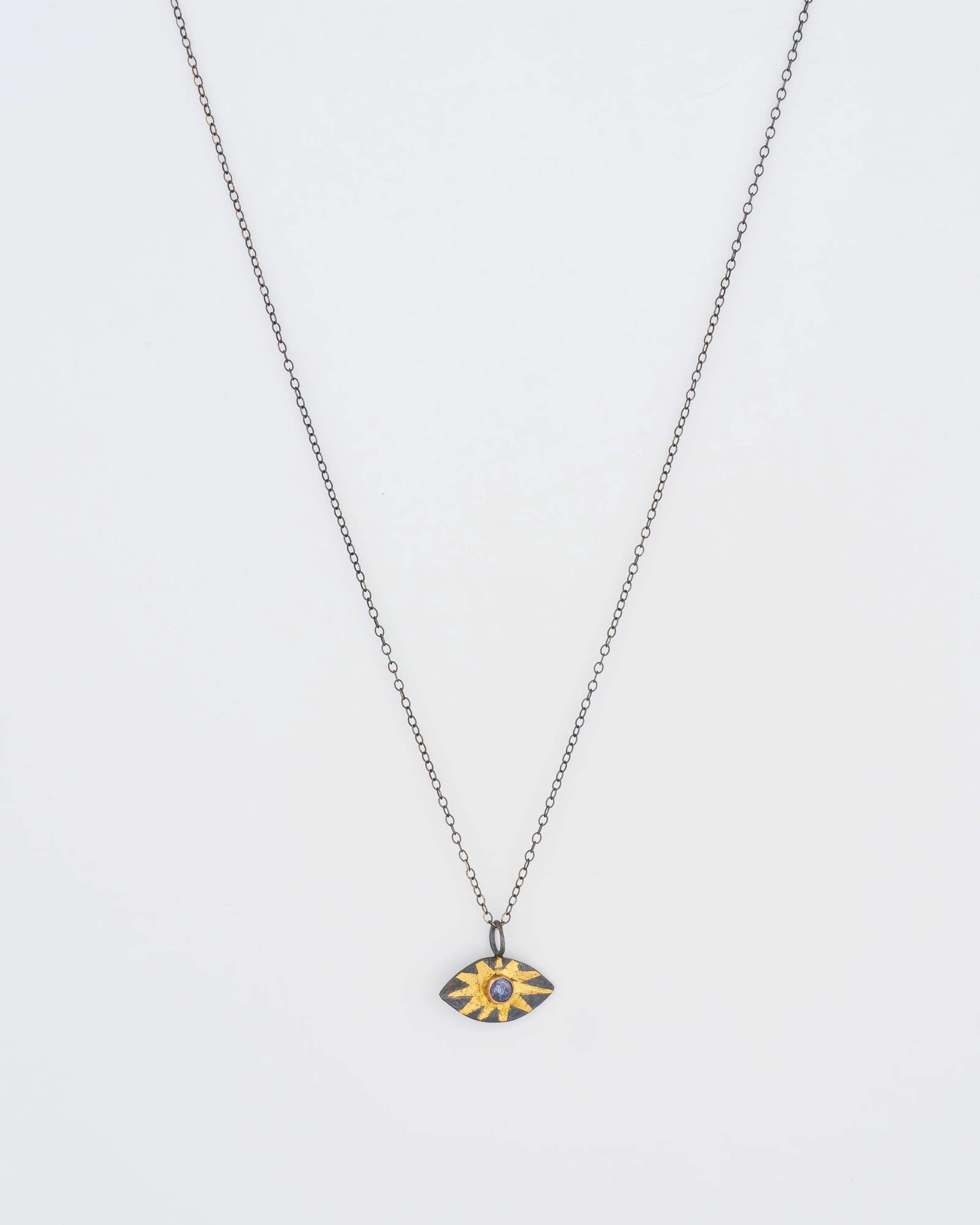 blue sapphire evil eye pendant necklace