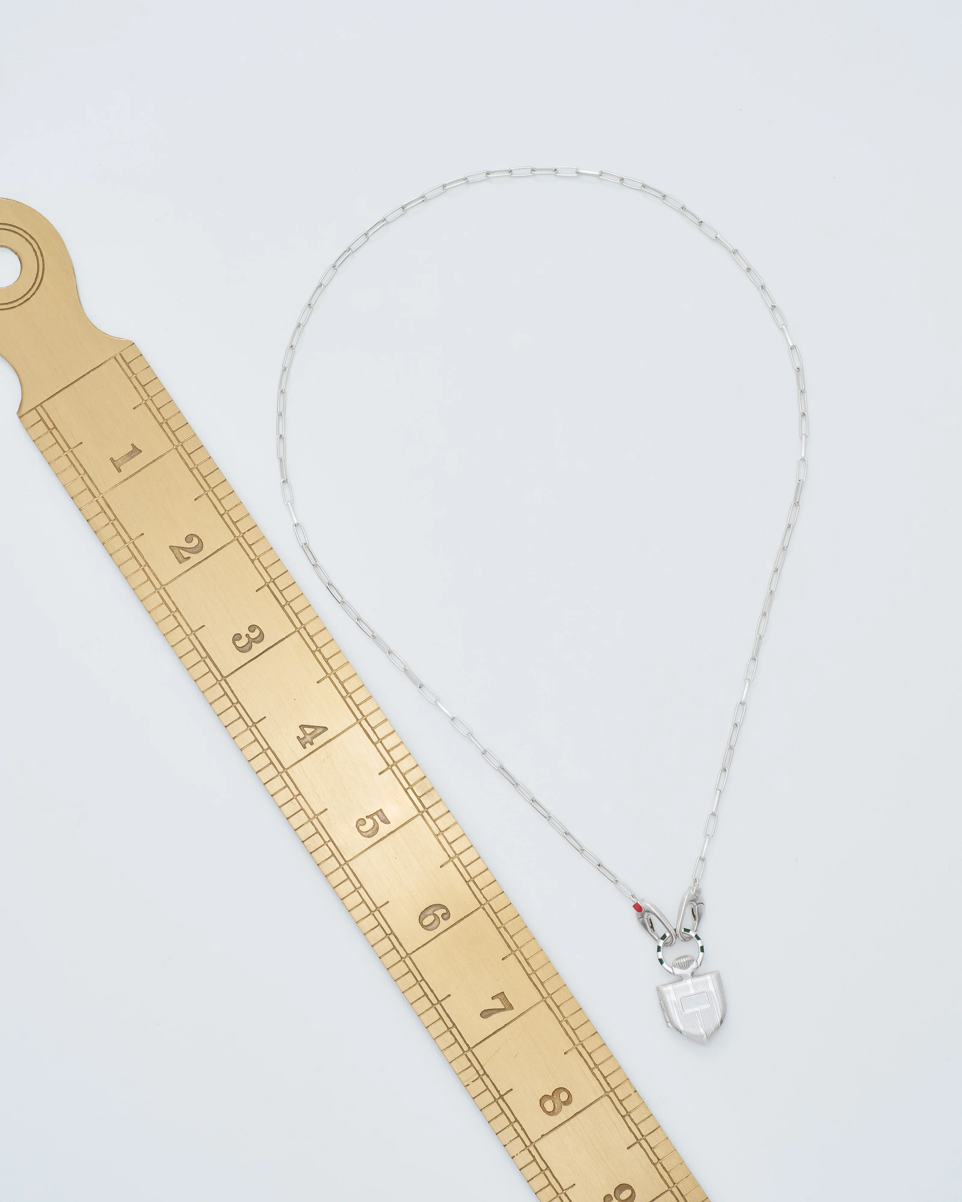 the curiouser vault (ss) w/ silver paperclip chain - Image 10
