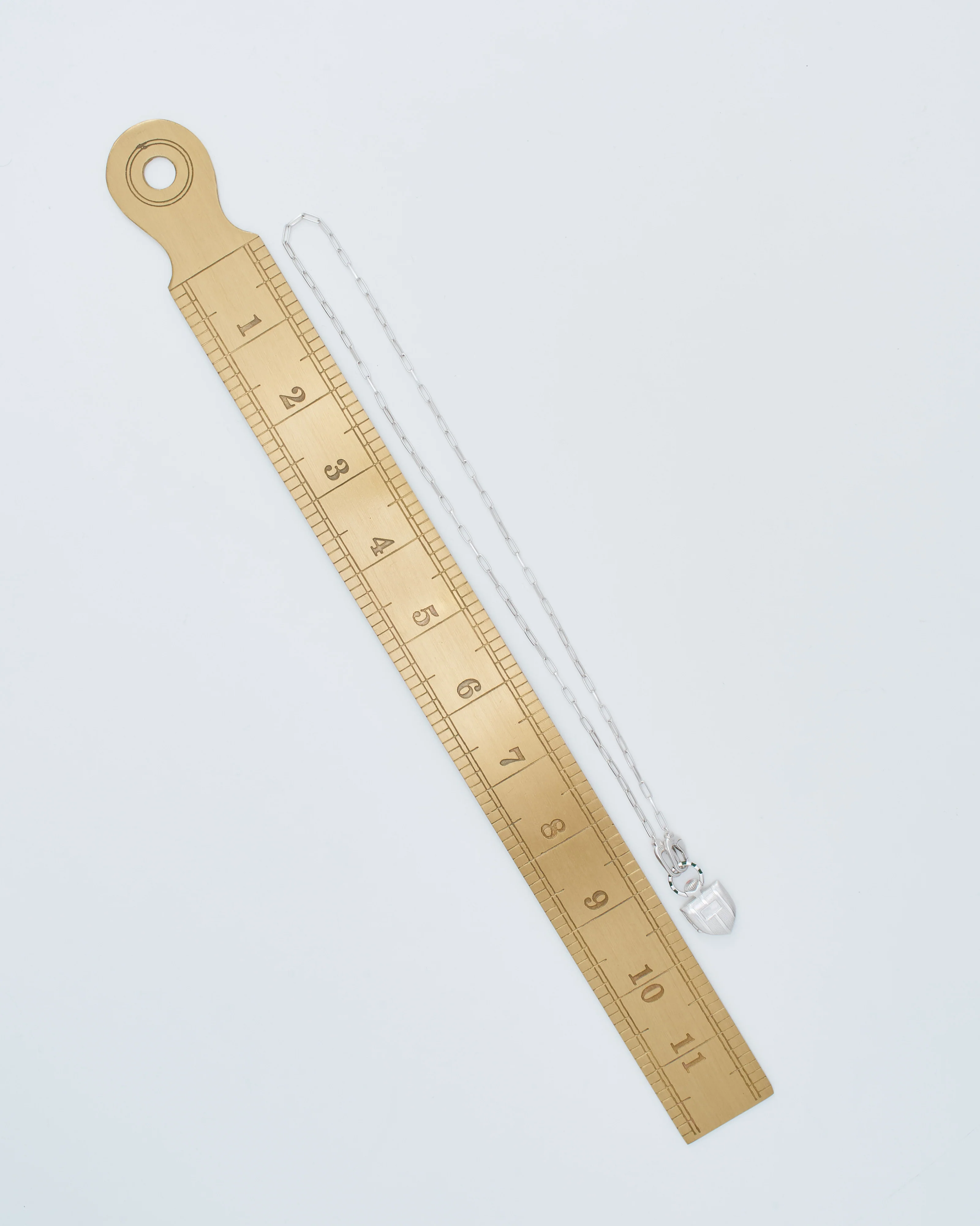 the curiouser vault (ss) w/ silver paperclip chain - Image 11