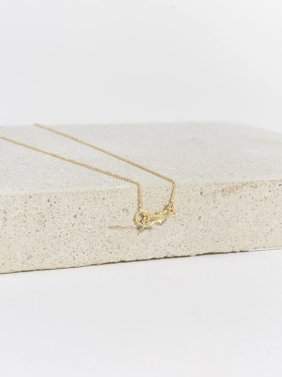 eroded disc necklace with rainbow sapphires - Image 4