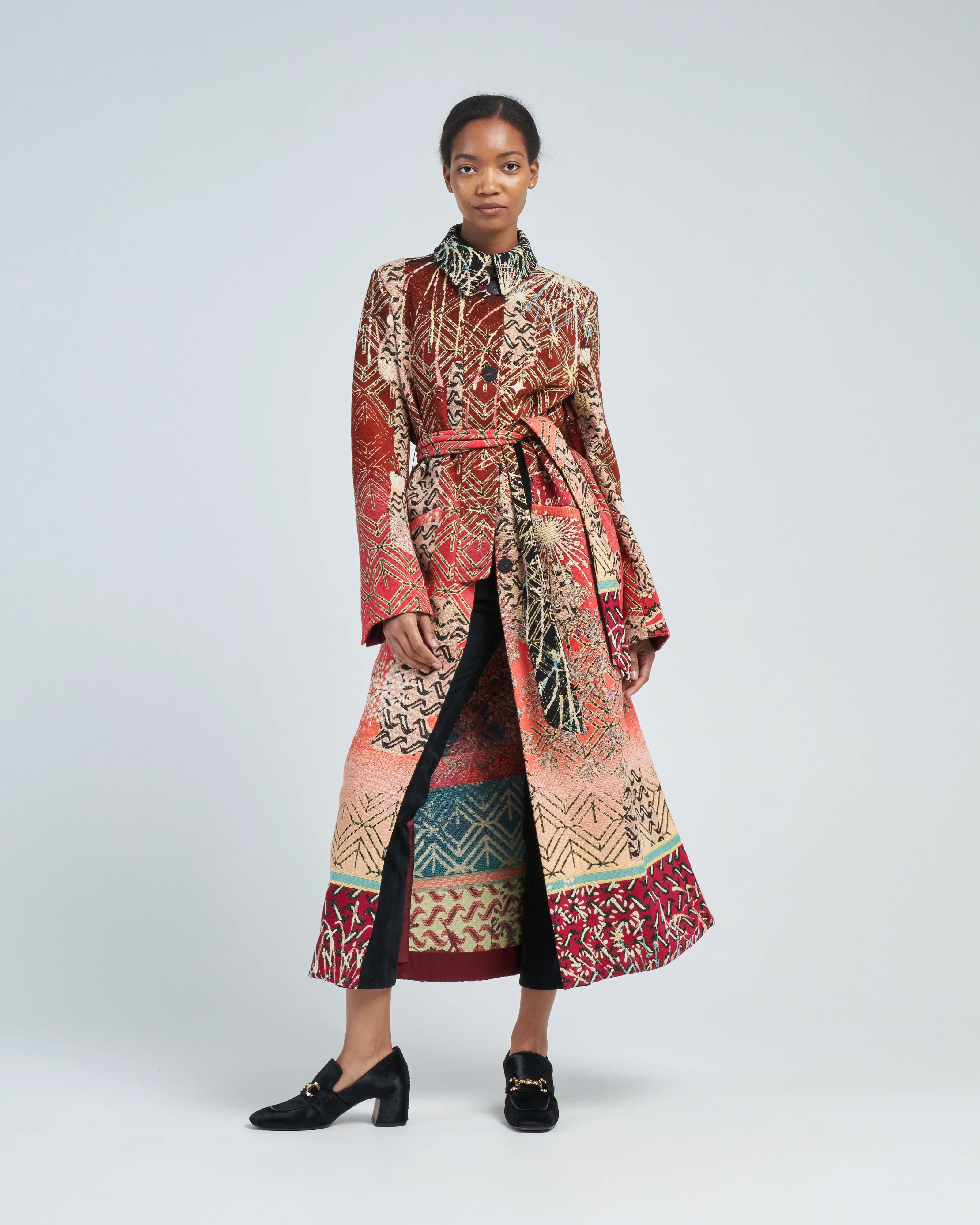 a leopard in the stars jacquard coat