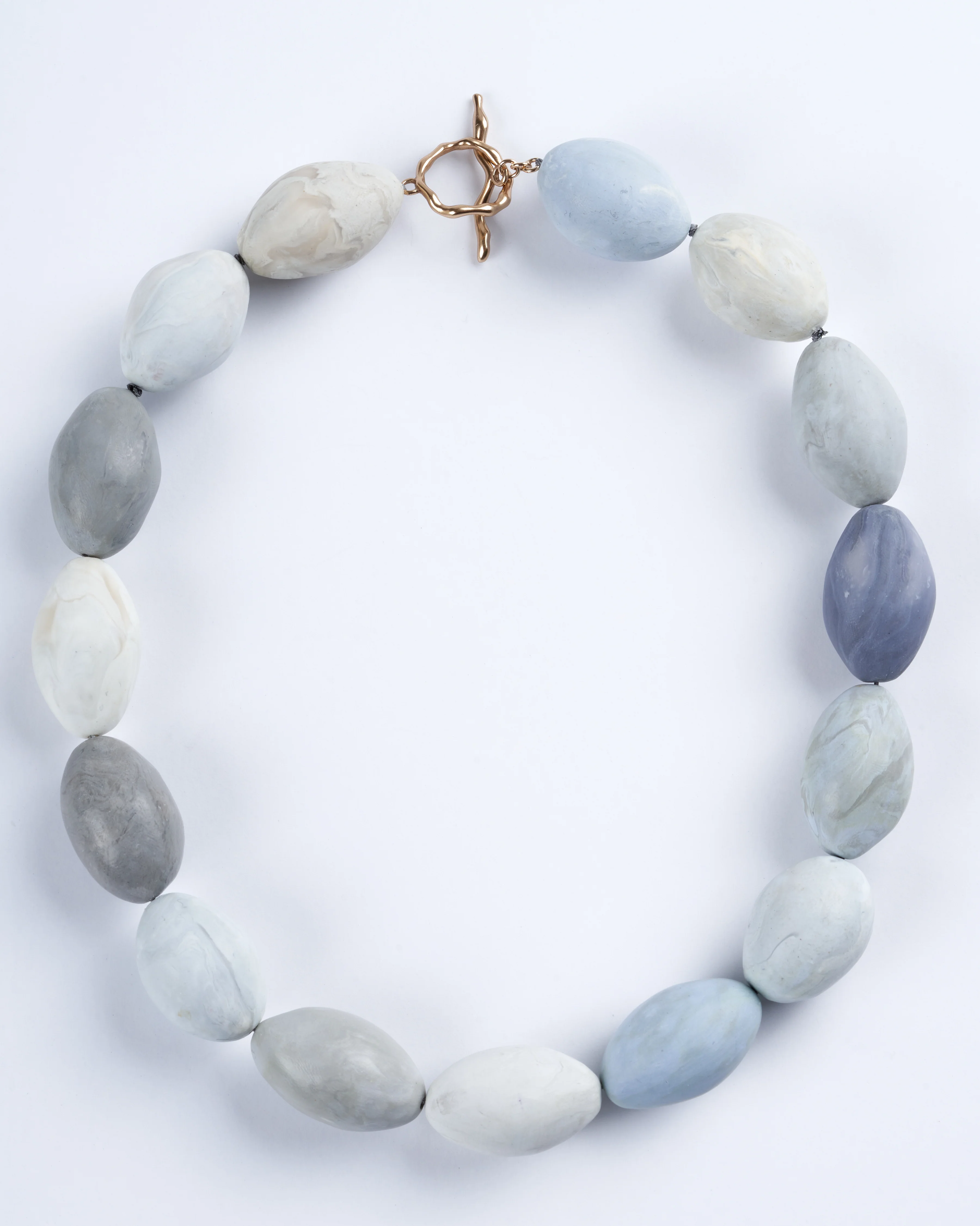 pompeii clay egg necklace - light blue
