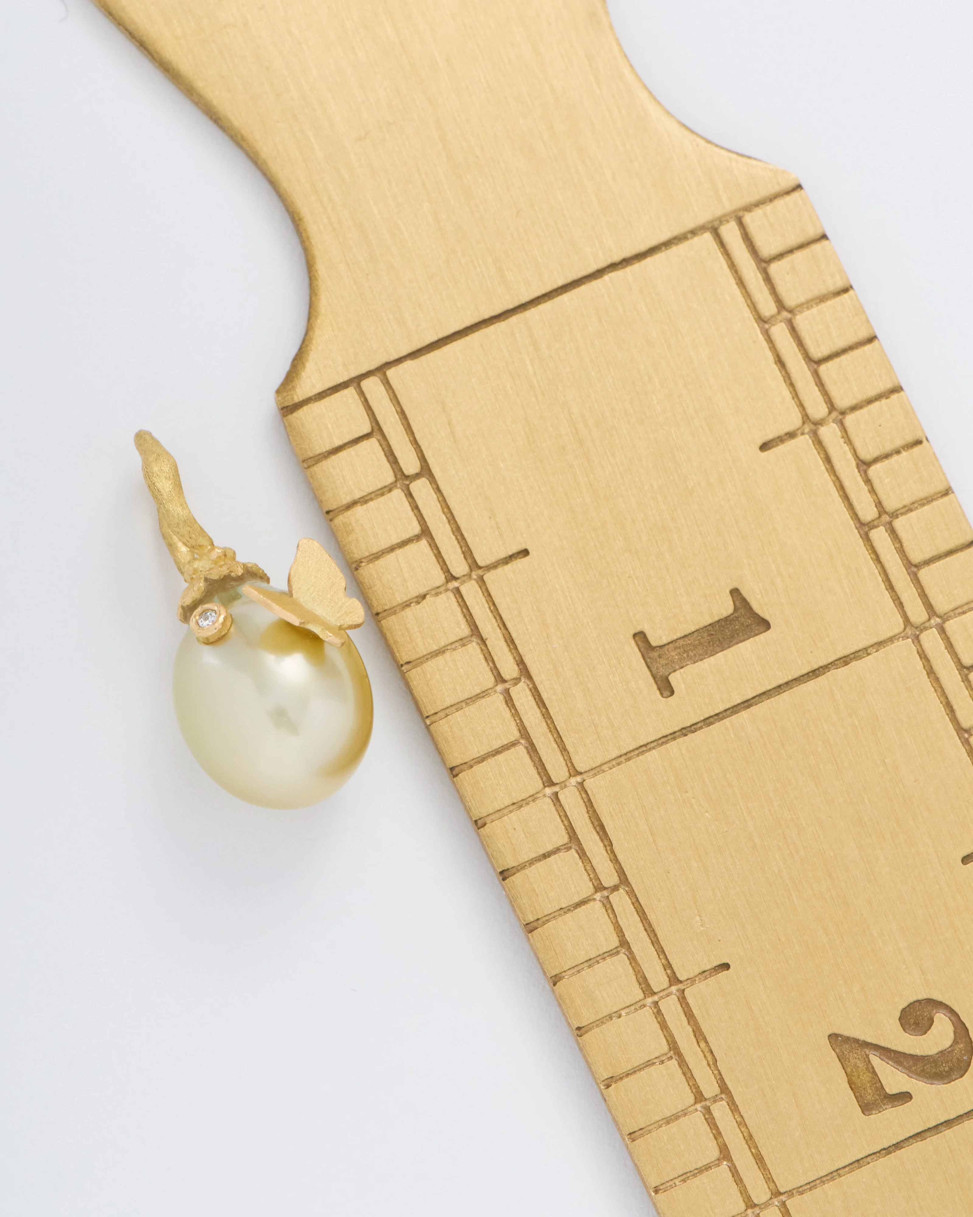 champagne pearl pendant with butterfly - Image 5