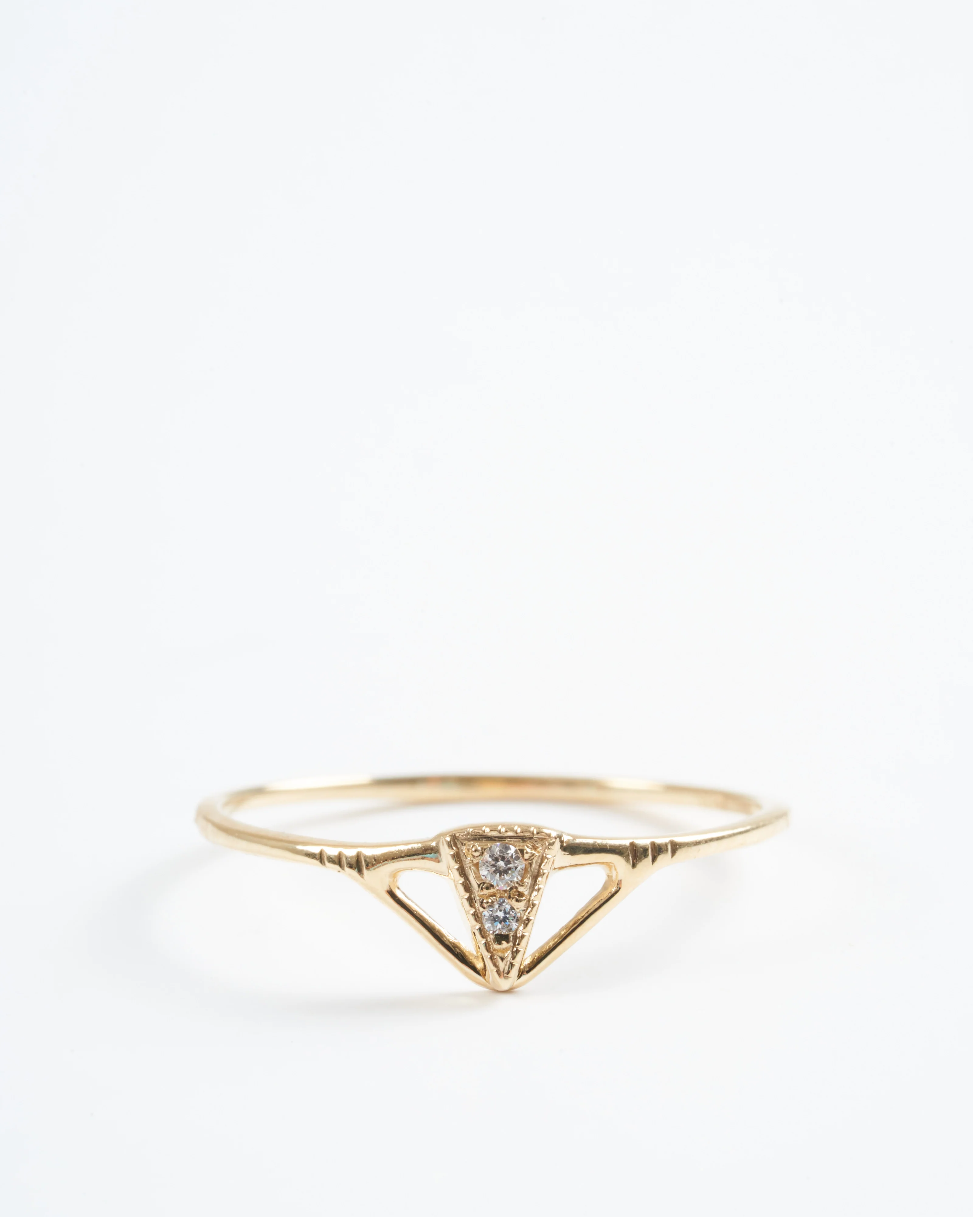tiny pyramid diamond ring