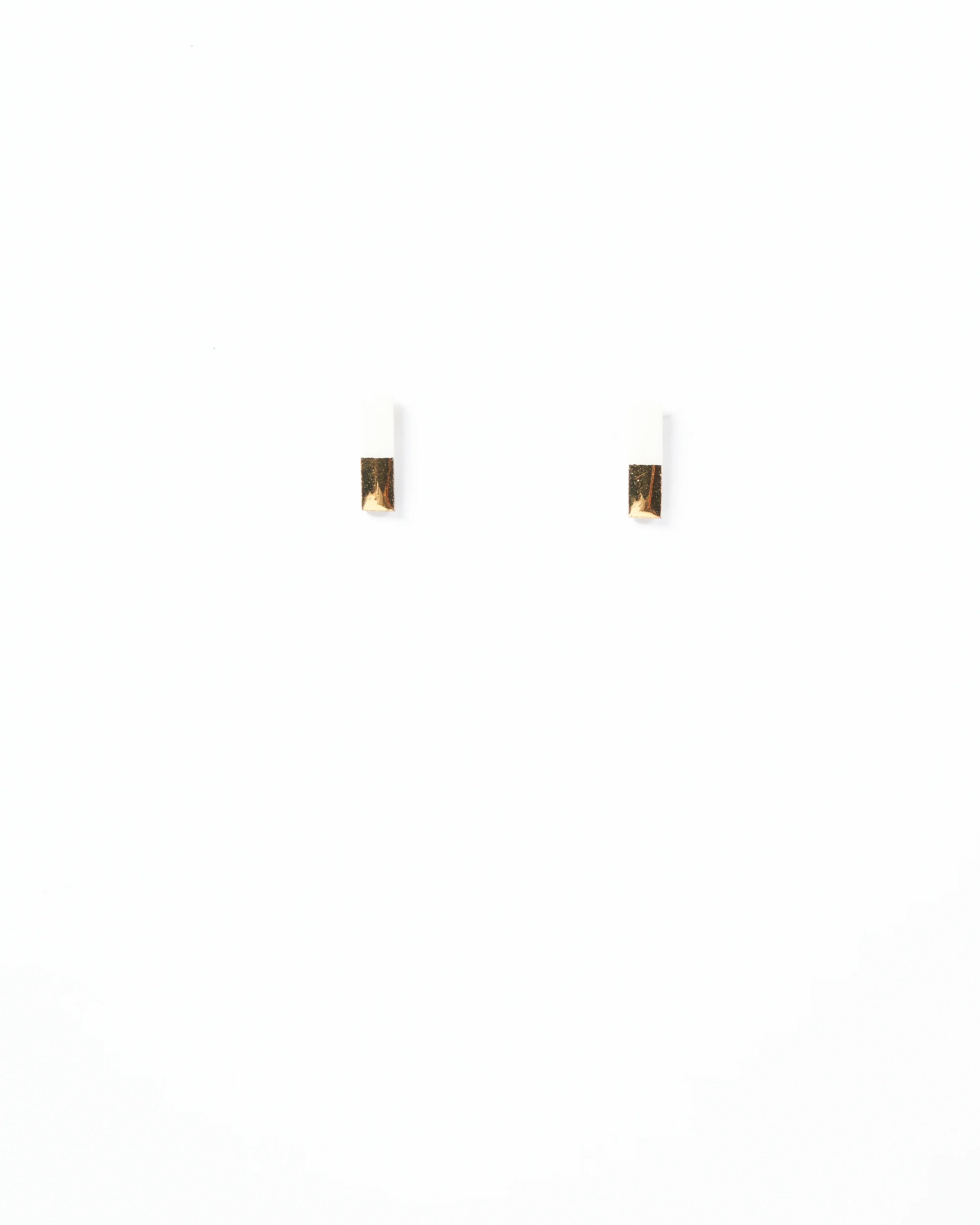 gold dipped bar studs - white