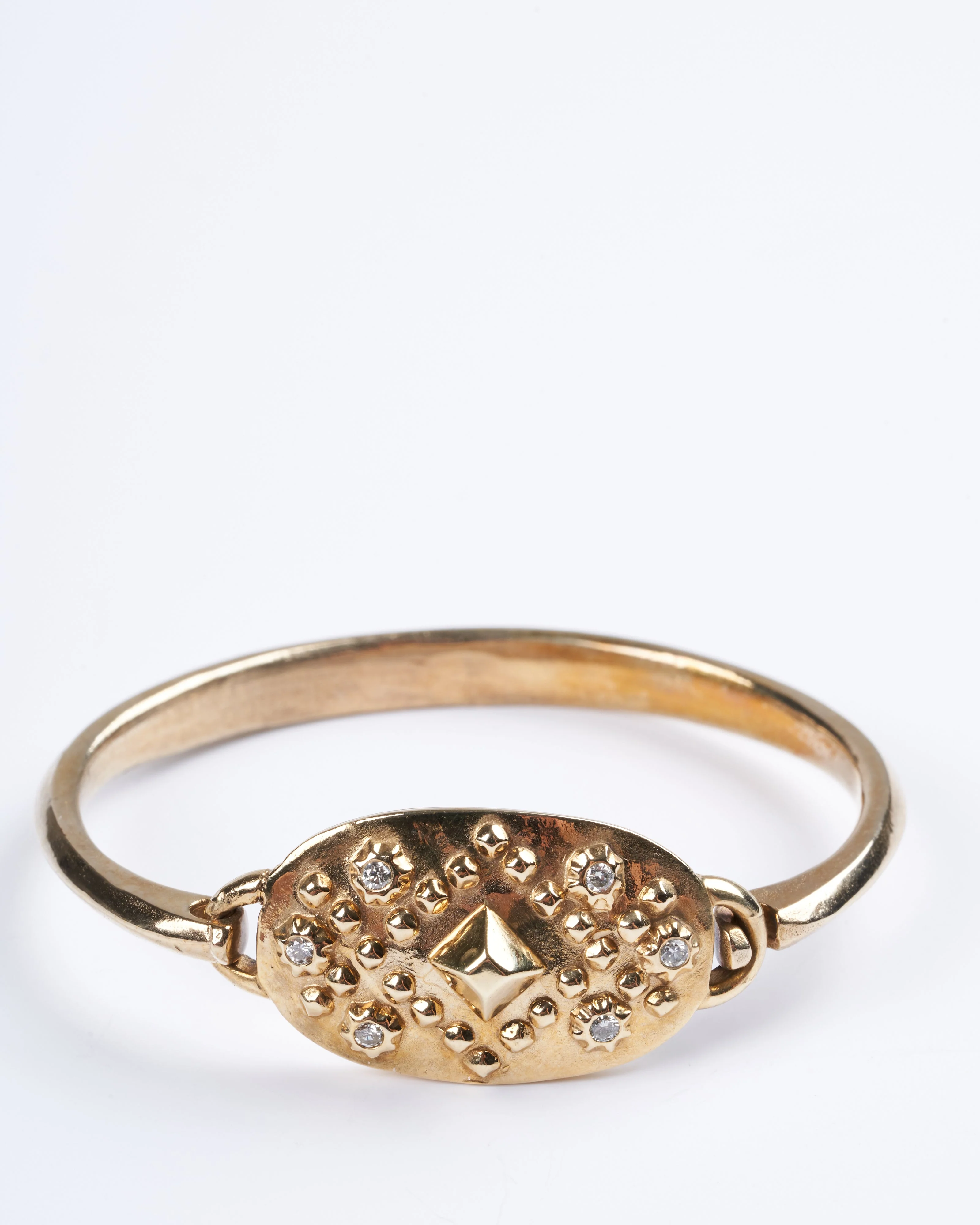 diamondback shield pyramid cuff - bronze