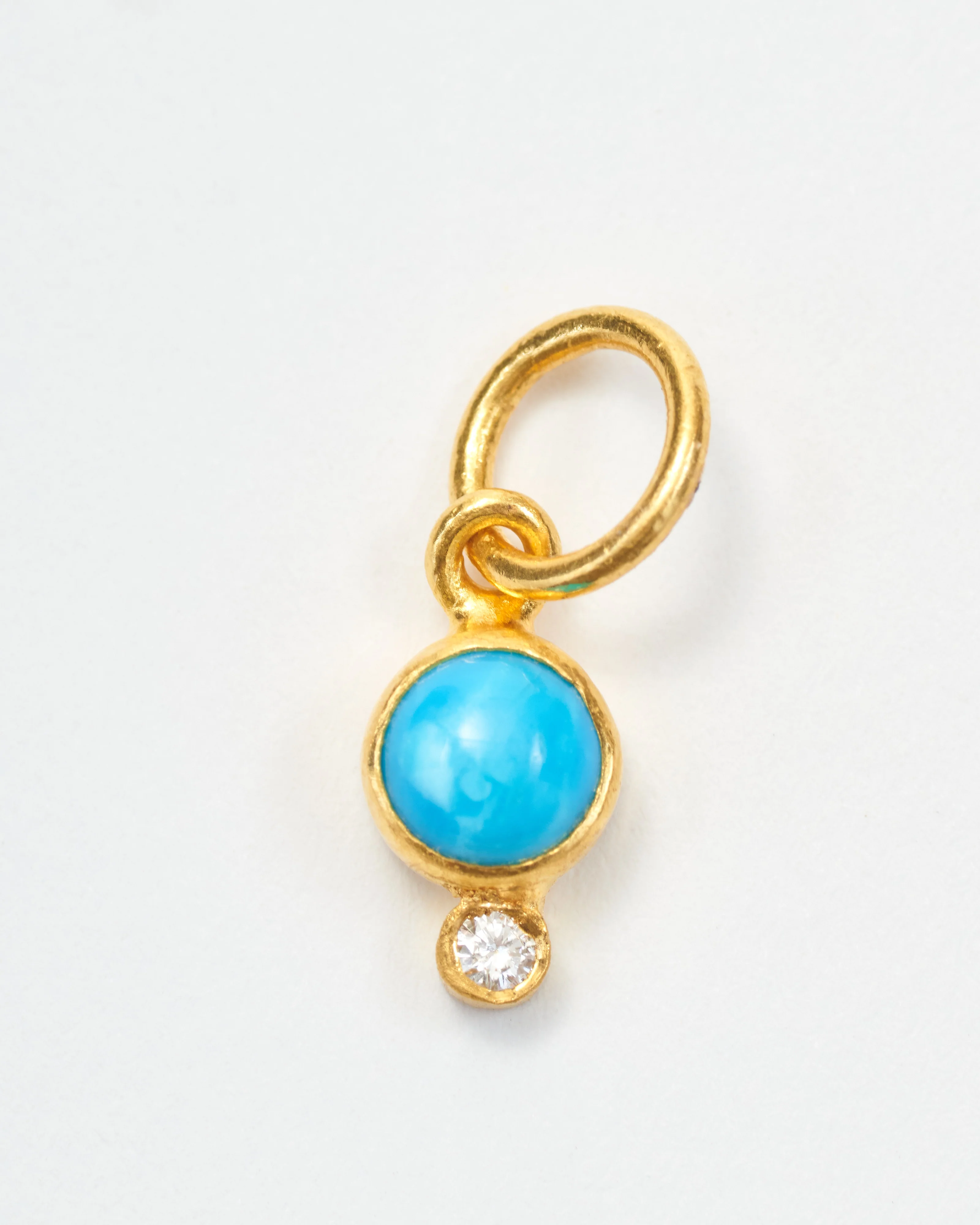 small turquoise pendant with diamond
