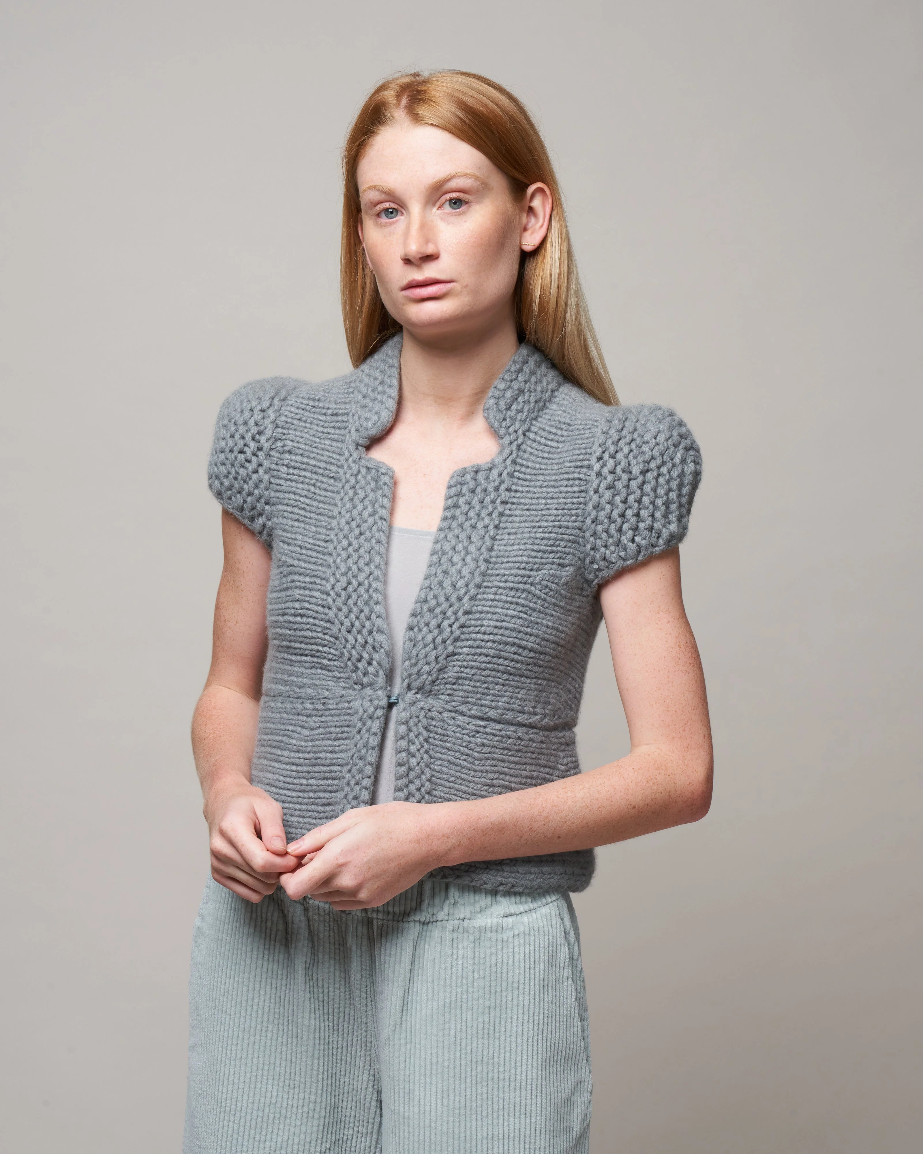 holly coat - cemento