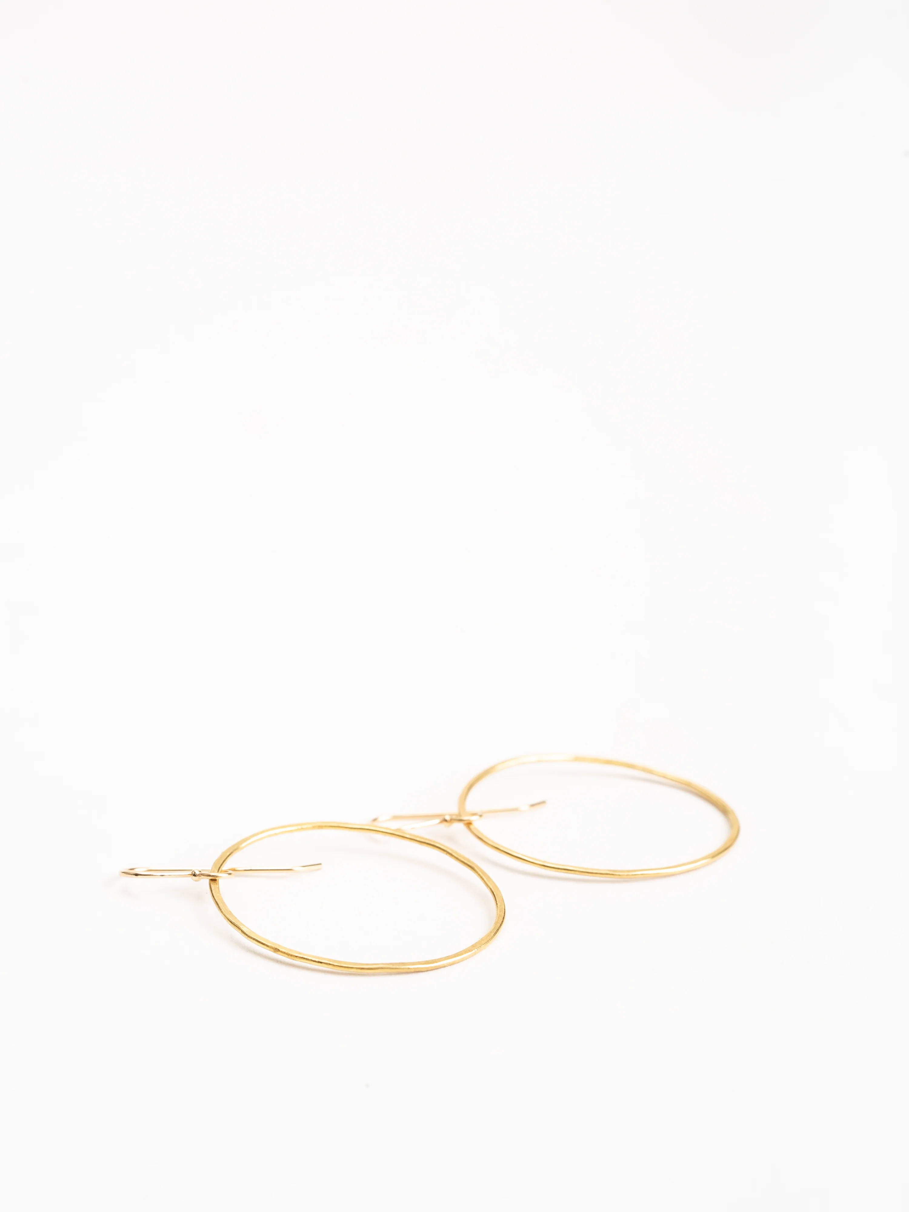 hammered gold oval hoops