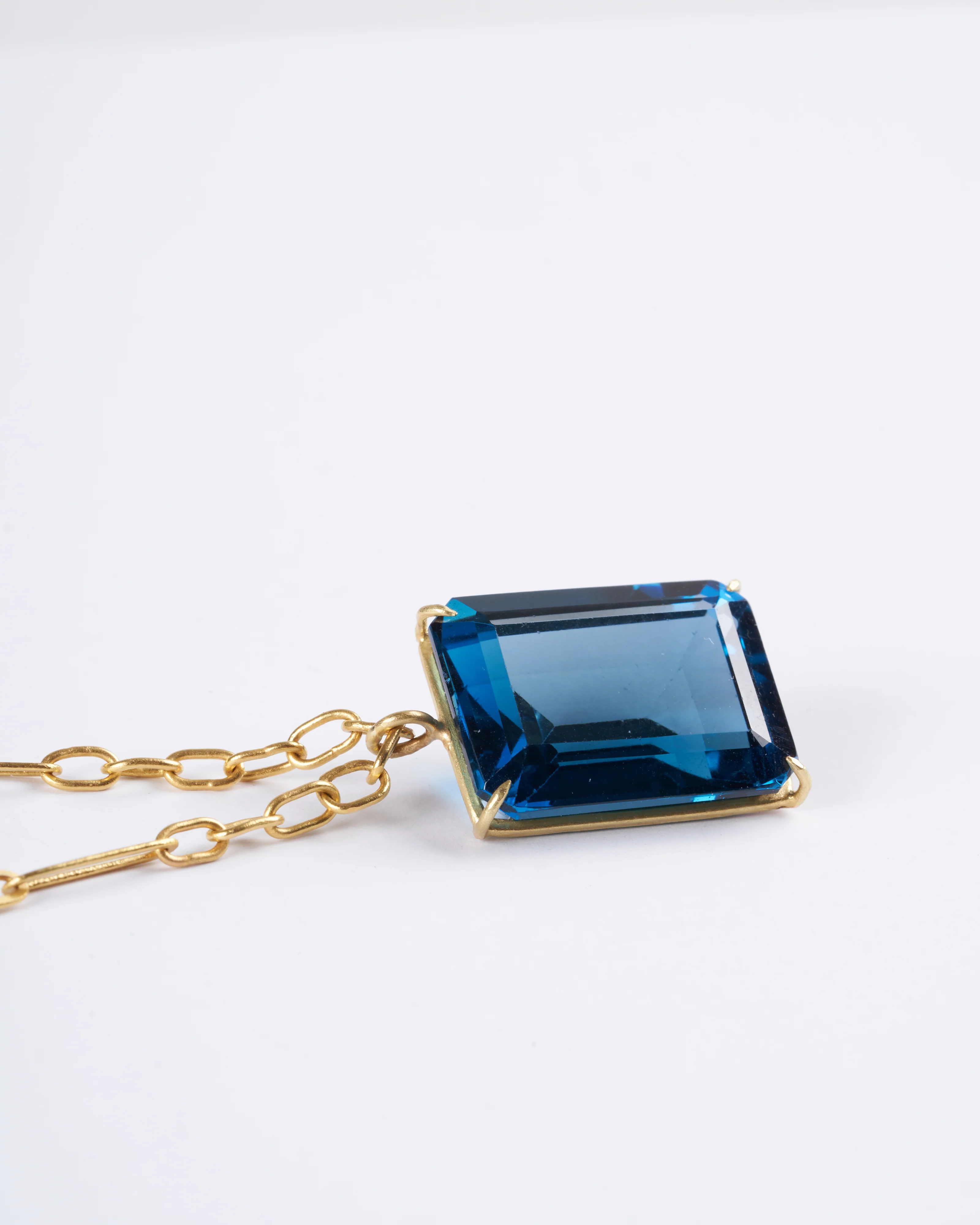 emerald cut london blue topaz set in yellow gold - Image 6
