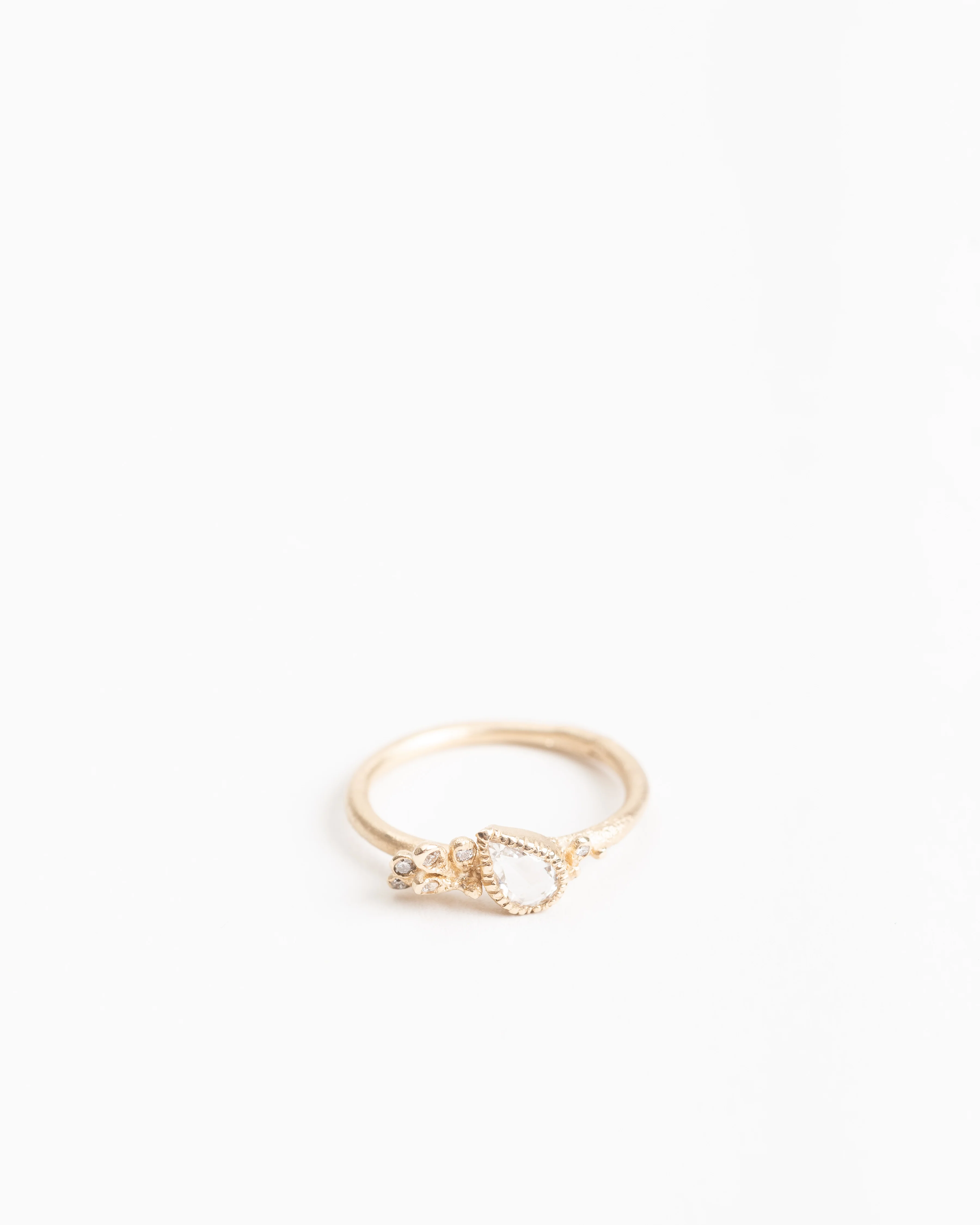 pear shaped diamond ring w/ paisley detail