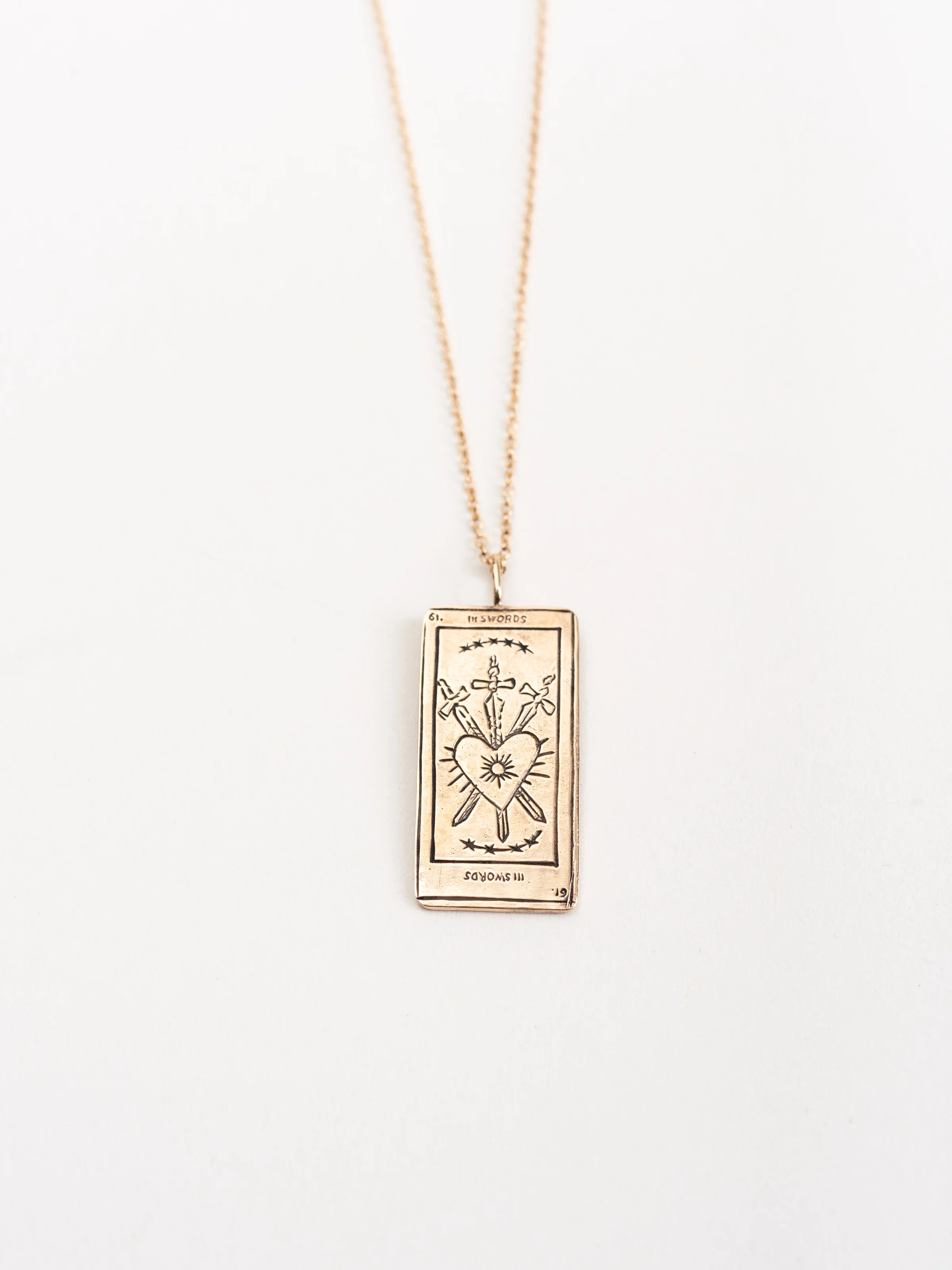 tarot card pendant - three of swords
