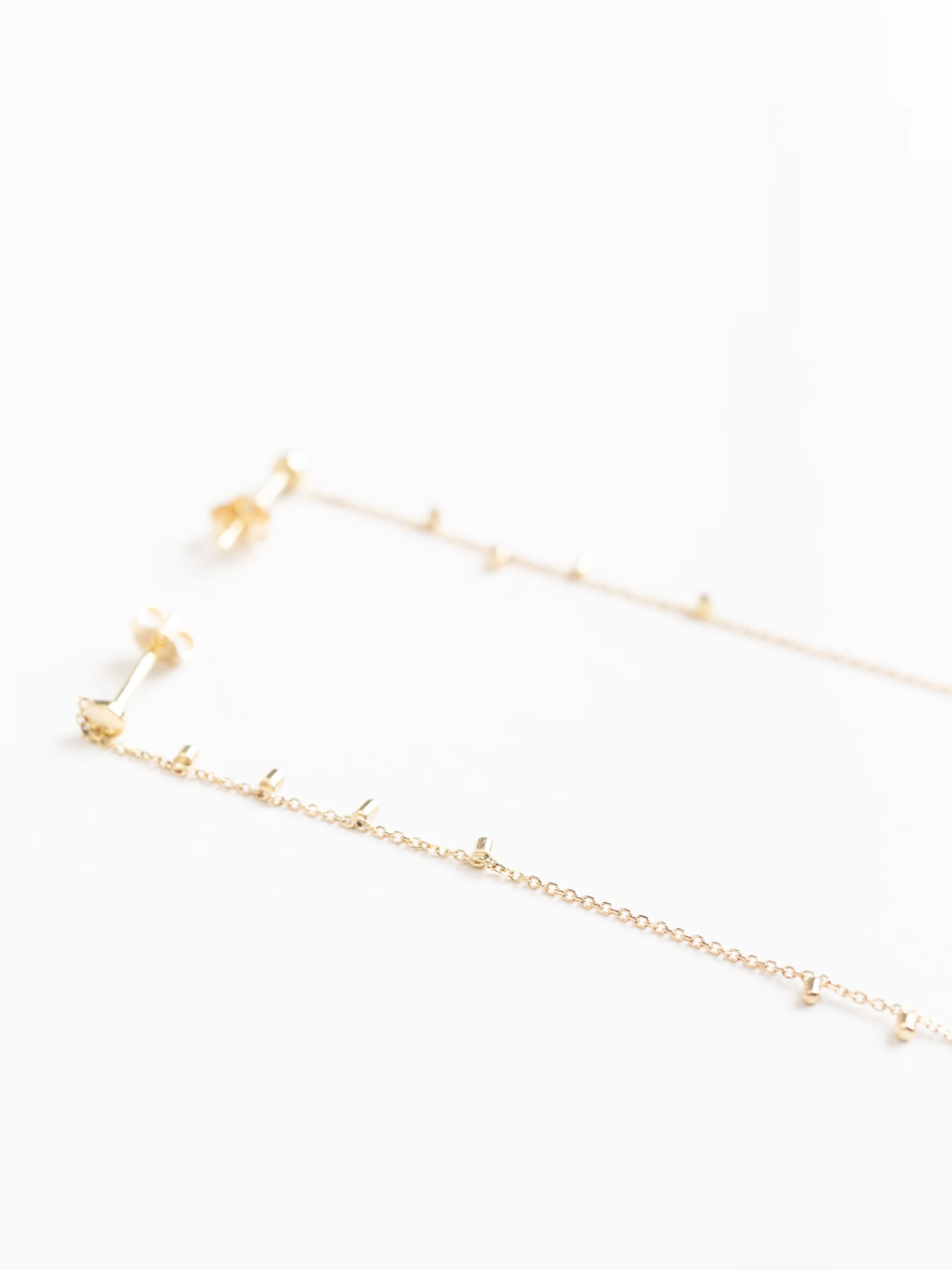 gold dust single strand earrings - Image 2