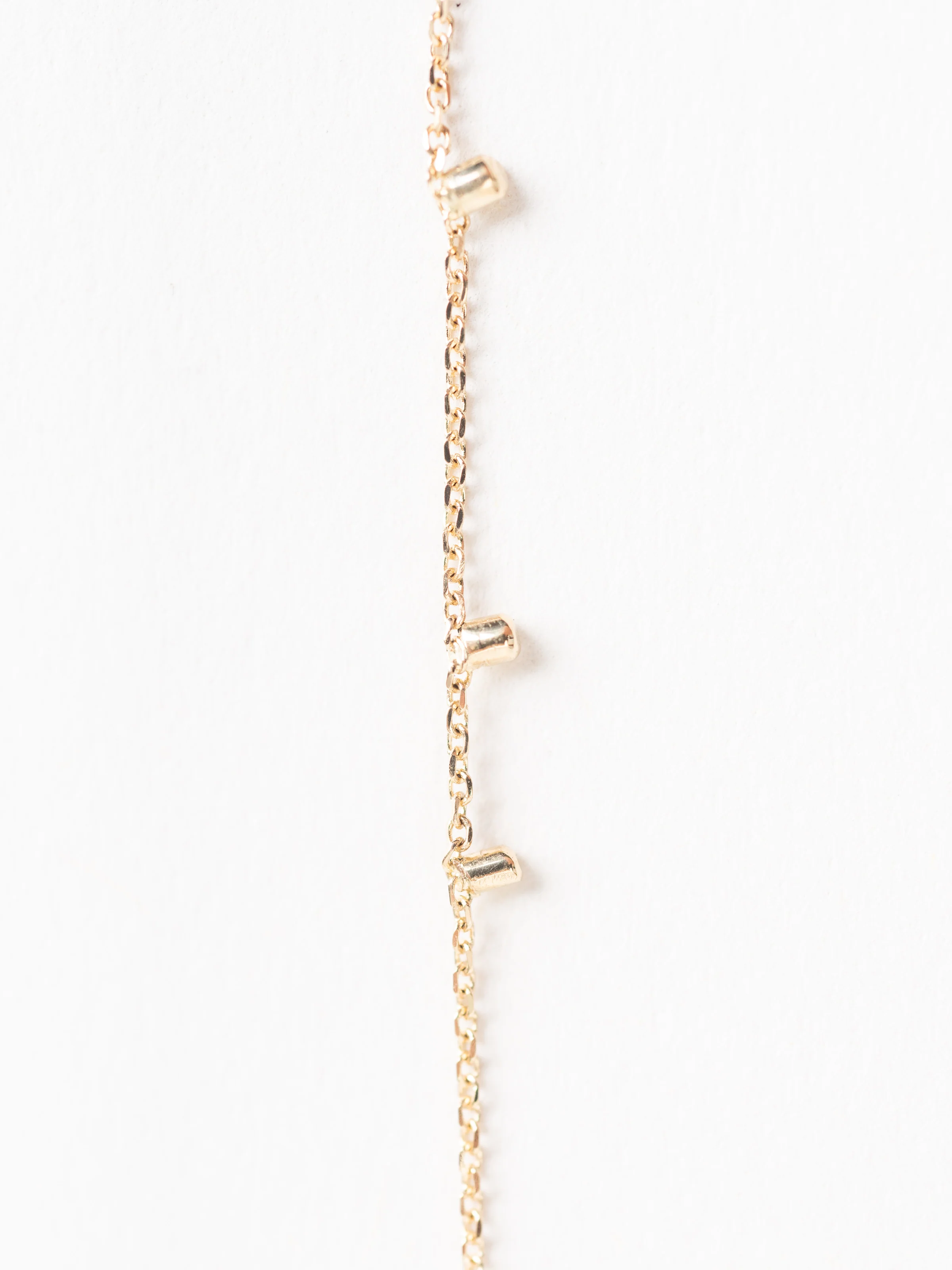 gold dust single strand earrings - Image 3