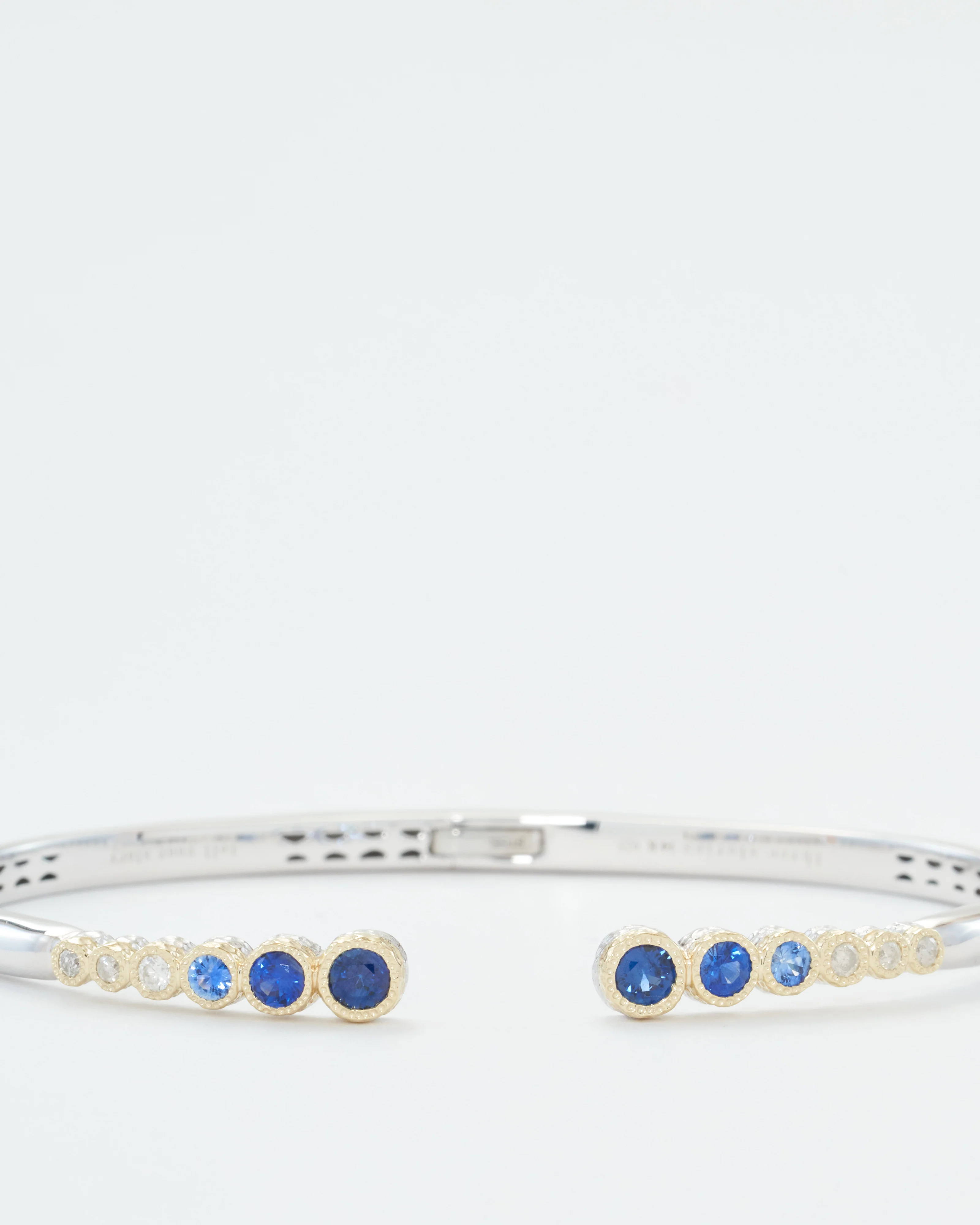 classic two-toned open bezel set sapphire bangle - Image 2