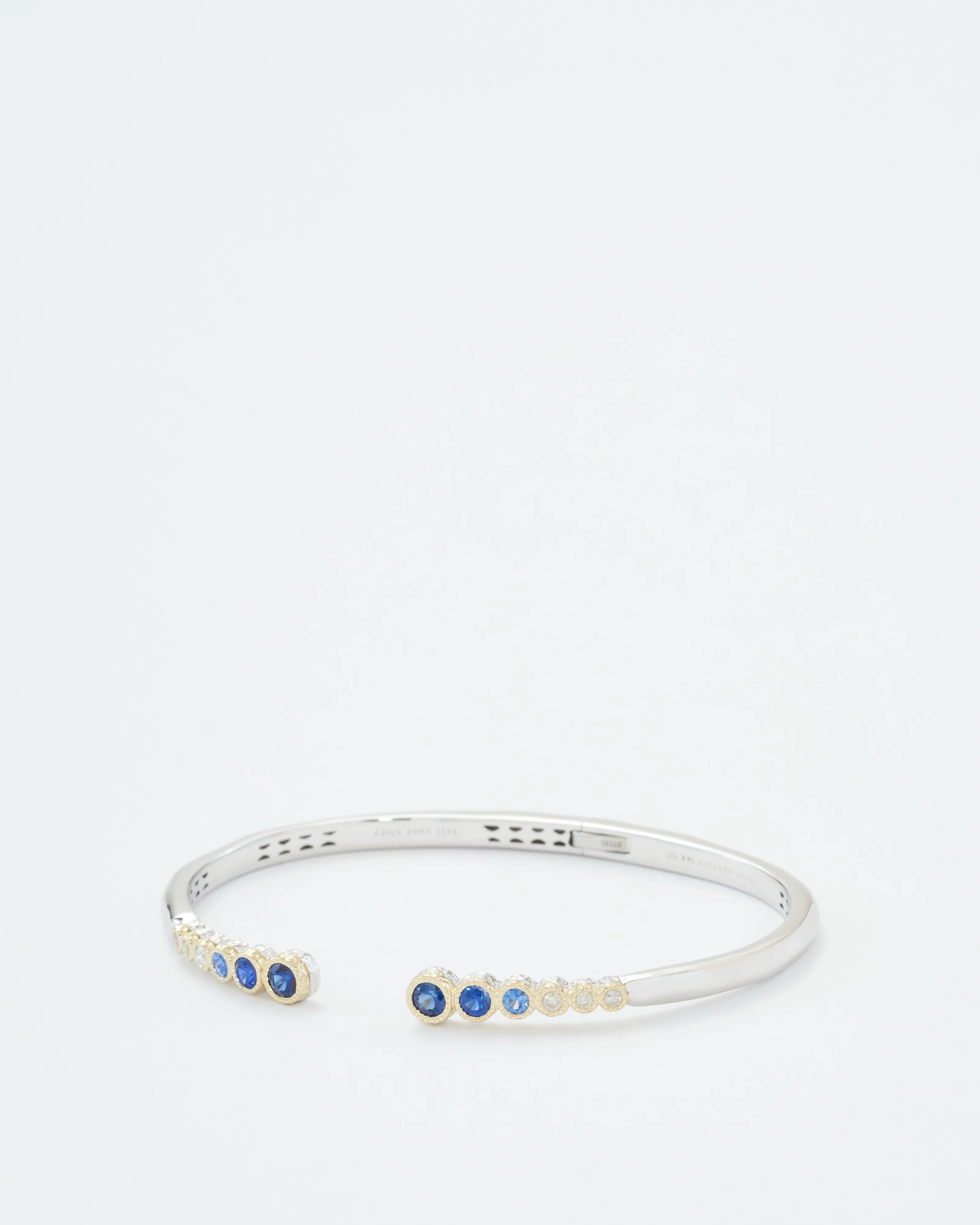 classic two-toned open bezel set sapphire bangle - Image 6