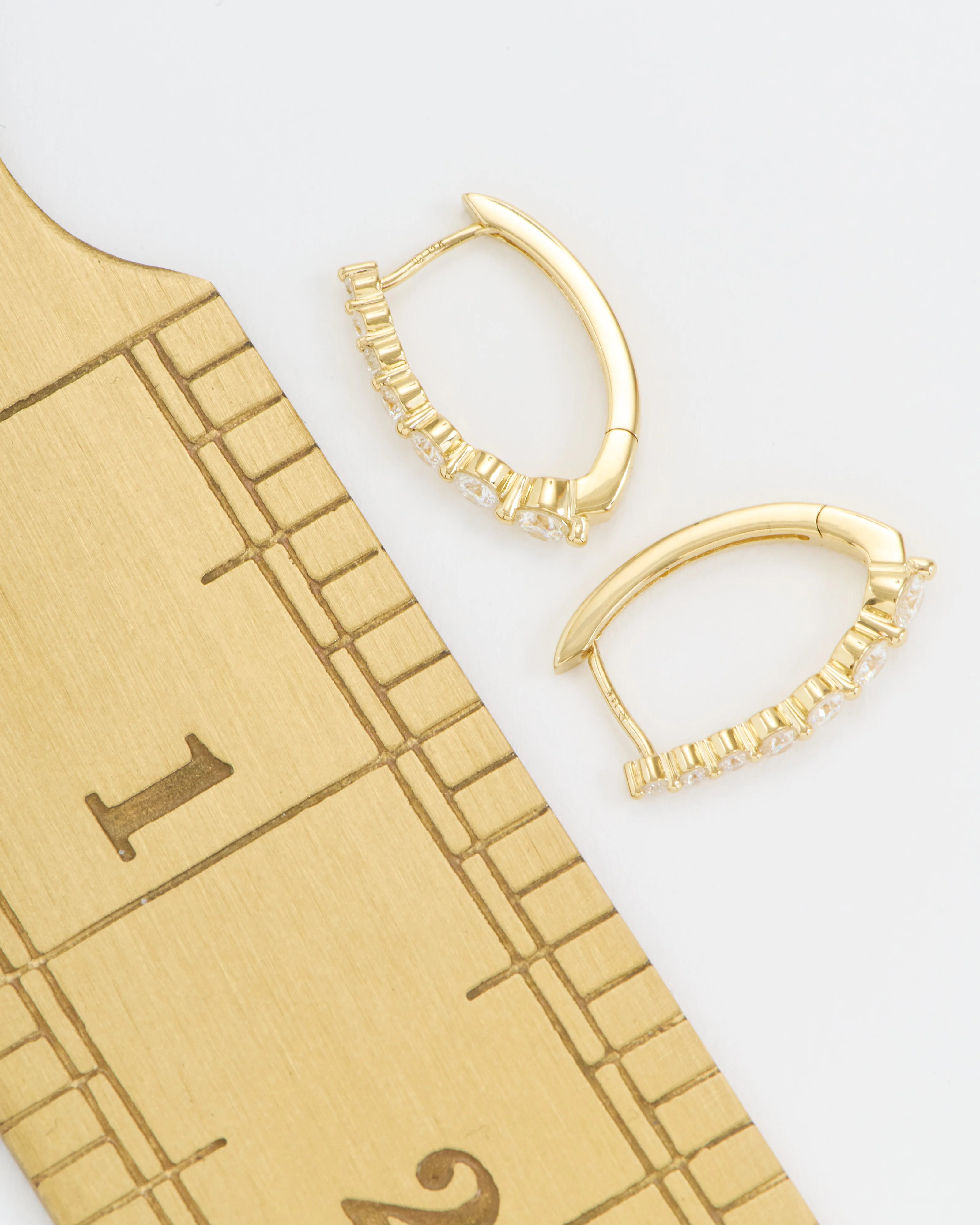 large oval graduated diamond hoops - Image 7