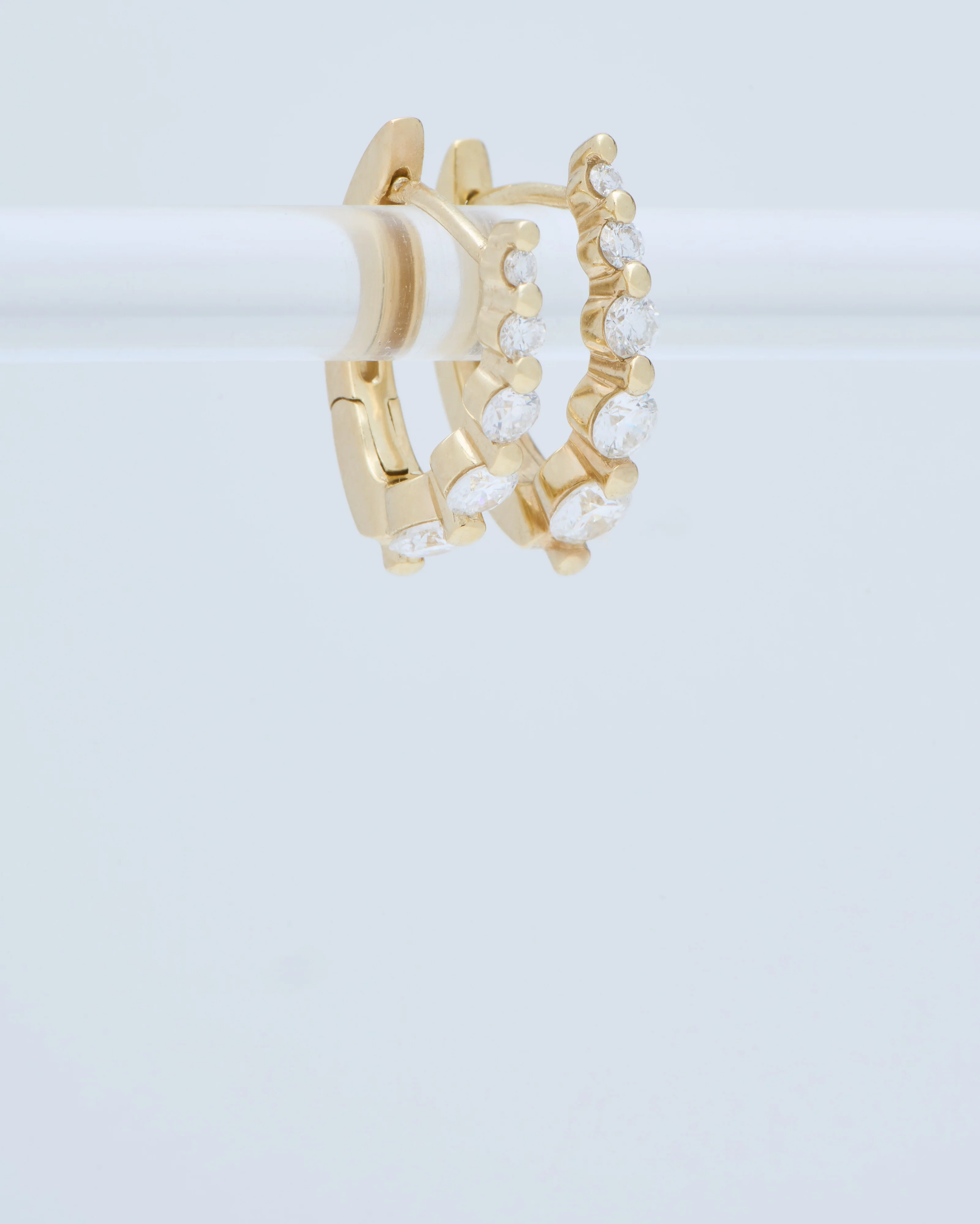 small oval graduated diamond huggie hoops - gold/diamonds - Image 4