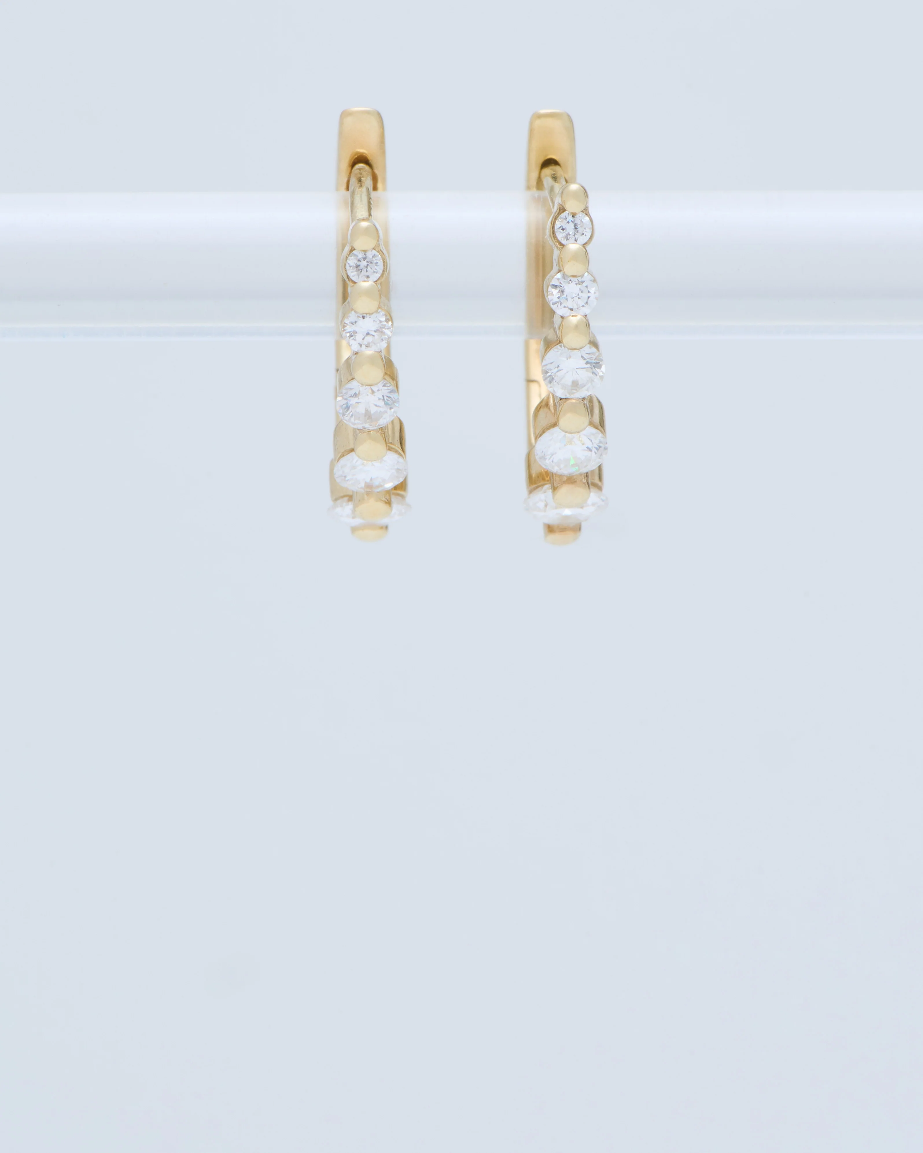 small oval graduated diamond huggie hoops - gold/diamonds - Image 6